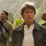 Tom Cruise como Ethan Hunt liderando sua equipe em cena de Mission: Impossible – Final Reckoning