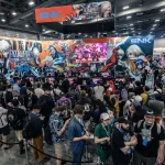 Público reunido em frente ao estande da SNK na Evo, com destaque para o banner de Fatal Fury: City of the Wolves e uma tela exibindo gameplay ao vivo.