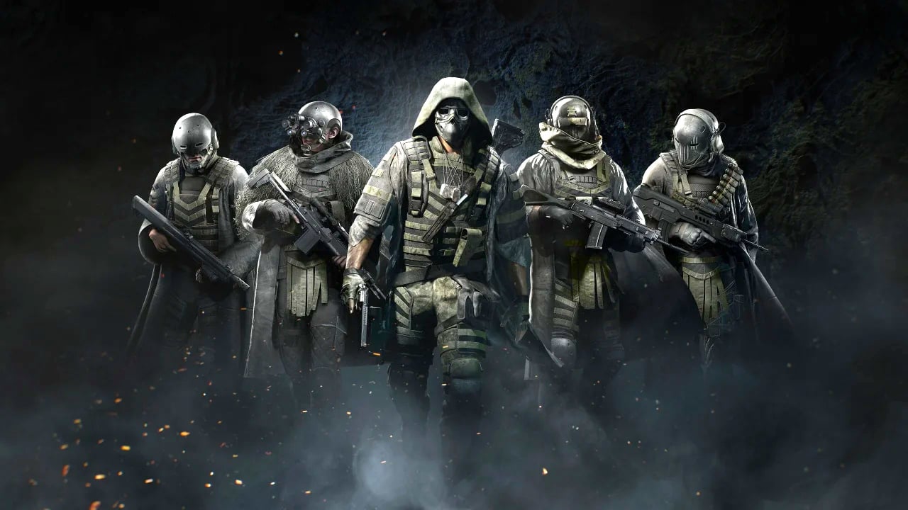 Soldados de elite armados em formação, em ambiente sombrio e com fumaça ao fundo, representando o novo Ghost Recon