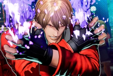 Personagem de Fatal Fury: City of the Wolves com expressão determinada, vestindo roupa vermelha e canalizando energia roxa com as mãos em chamas.