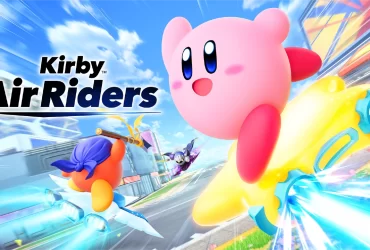 Arte oficial de Kirby Air Riders para Nintendo Switch 2. A ilustração mostra Kirby sorridente em uma máquina amarela voadora, seguido por Bandana Waddle Dee e Meta Knight em uma corrida futurista com efeitos de velocidade.
