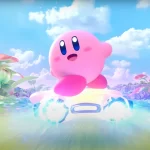 Kirby sorridente pilota uma estrela brilhante em alta velocidade por um campo florido, com céu azul e nuvens ao fundo.