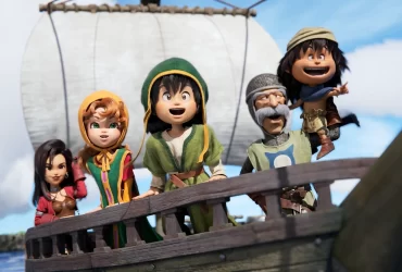 Personagens de Dragon Quest VII Reimagined observam animados o horizonte a bordo de um navio, com estilo visual artesanal em 3D.