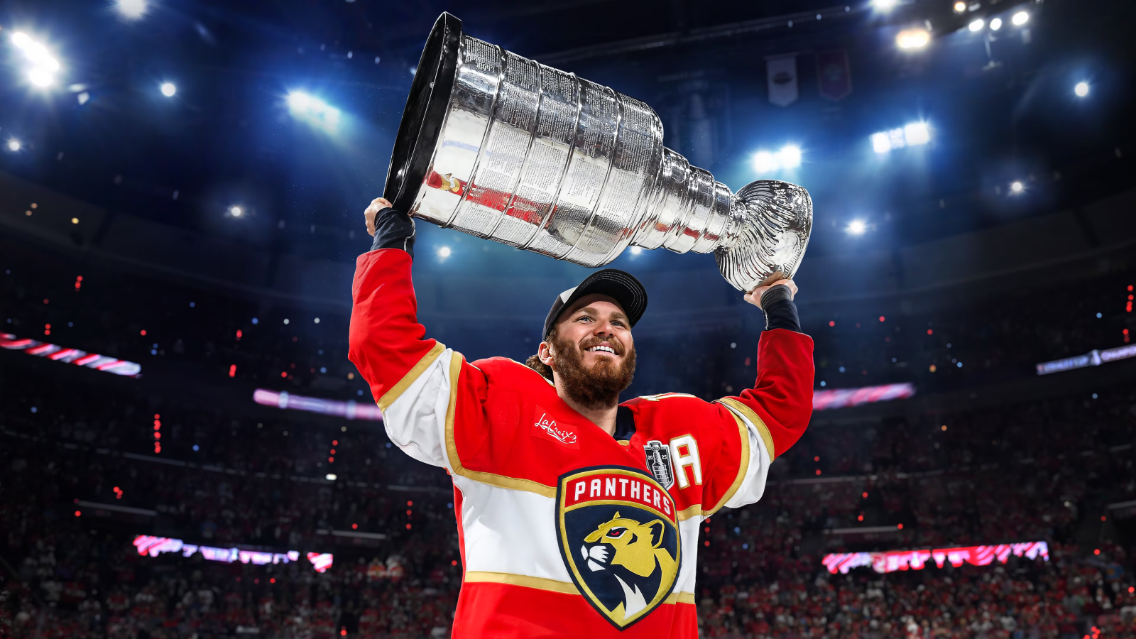 Jogador levantando o troféu no NHL 26 durante a celebração da vitória.