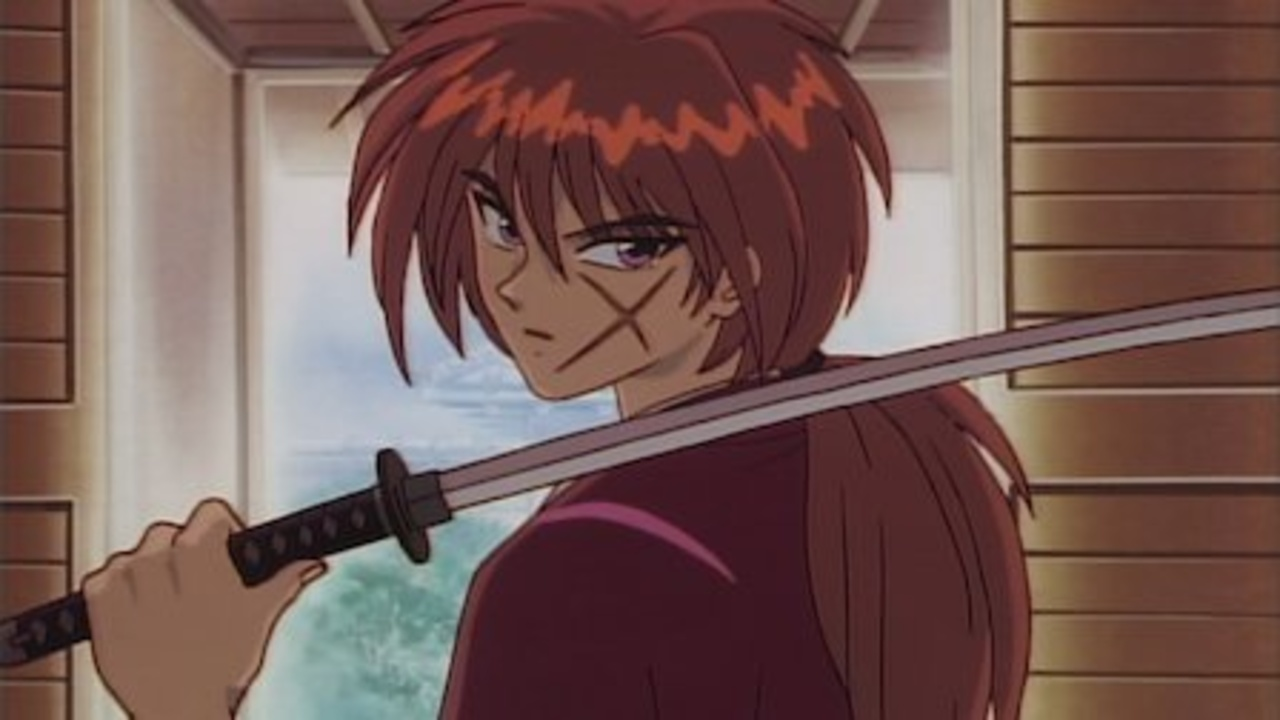 Kenshin Himura com sua katana, o ex-retalhador em busca de redenção no anime Samurai X.