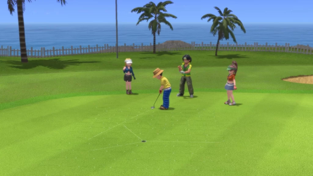 Cena de gameplay de Everybody’s Golf Hot Shots mostrando quatro personagens em um campo à beira-mar; um deles se prepara para finalizar a jogada com um putt próximo ao buraco enquanto os outros observam.