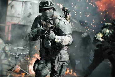 Soldado fortemente armado avança em meio a explosões e destroços durante uma batalha intensa em Battlefield 6.