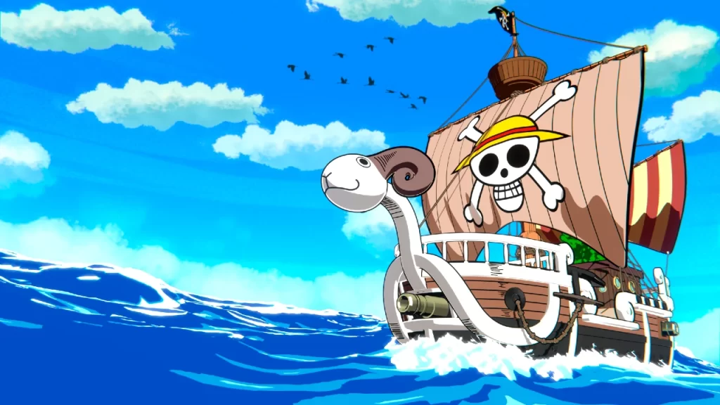 O navio Going Merry navega pelos mares sob um céu azul em One Piece, com a vela exibindo o símbolo do Chapéu de Palha, representando o início da jornada pirata de Luffy e seus amigos.