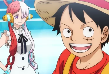 Luffy sorrindo ao lado de Uta em uma cena colorida de One Piece Film: Red, representando a amizade e a alegria que definem o anime.