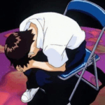 Shinji Ikari de Evangelion sentado curvado em cadeira demonstrando depressão trauma e isolamento emocional
