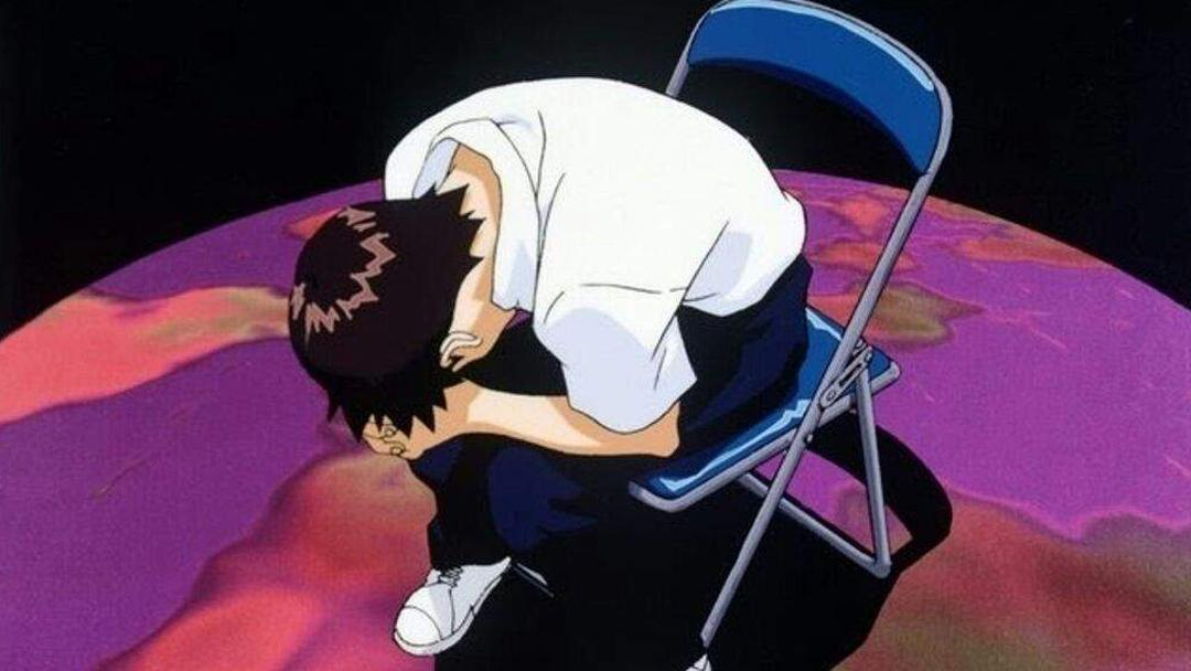 Shinji Ikari de Evangelion sentado curvado em cadeira demonstrando depressão trauma e isolamento emocional