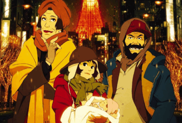 Três protagonistas de Tokyo Godfathers — Gin, Hana e Miyuki — segurando um bebê em frente à Torre de Tóquio iluminada à noite com decorações natalinas douradas