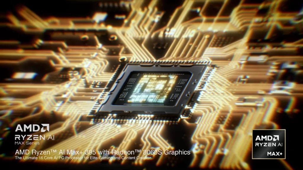 Chip AMD Ryzen AI Max+ 395 com gráficos Radeon 8060S exibido sobre placa de circuito dourada, representando alto desempenho em jogos e inteligência artificial.