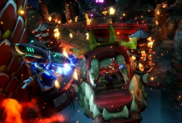 Sonic e outros personagens disputam corrida em uma pista cheia de fogo e estruturas orientais, passando por dentro da boca de uma criatura gigante em um cenário noturno.