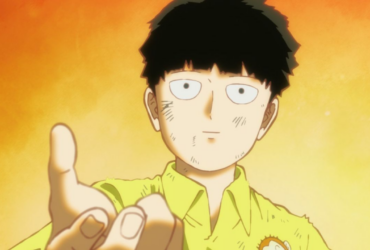 Shigeo “Mob” Kageyama, protagonista de Mob Psycho 100, em primeiro plano com o braço estendido, expressão calma e olhos bem abertos, sobre um fundo quente em tons de laranja e amarelo.