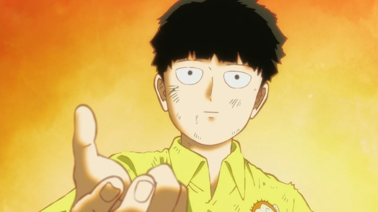 Shigeo “Mob” Kageyama, protagonista de Mob Psycho 100, em primeiro plano com o braço estendido, expressão calma e olhos bem abertos, sobre um fundo quente em tons de laranja e amarelo.