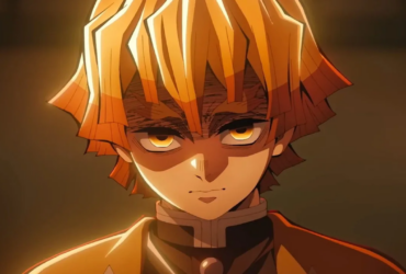 Zenitsu Agatsuma, de Demon Slayer, com expressão séria e olhos intensos, iluminado por tons quentes, sugerindo o momento em que ele entra no estado de luta e usa a Respiração do Trovão.