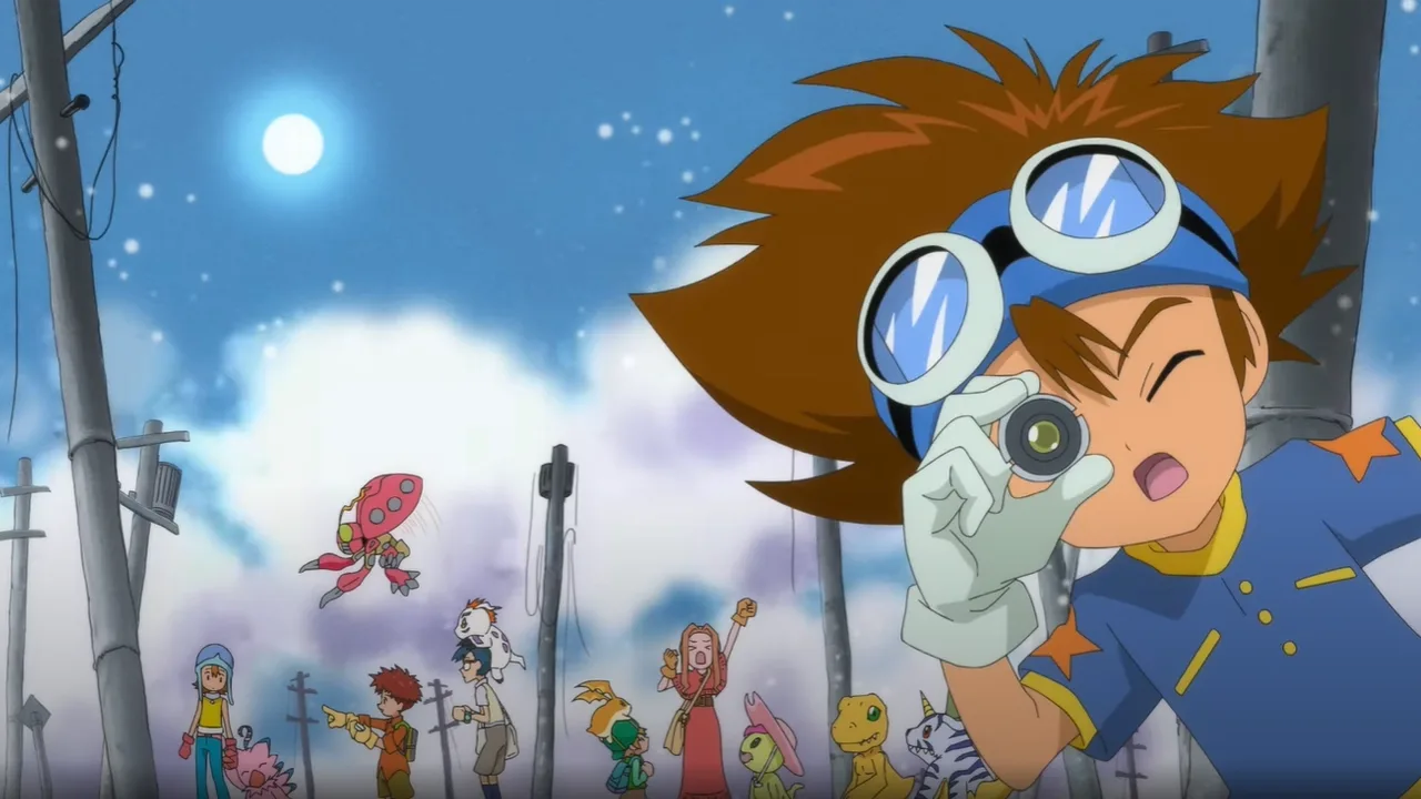 Tai (Taichi) Kamiya em primeiro plano, usando óculos de proteção na cabeça e segurando um pequeno dispositivo perto do olho, como se estivesse observando. Ao fundo aparecem os outros escolhidos e vários Digimon (incluindo Agumon), em um cenário externo à noite com lua no céu.