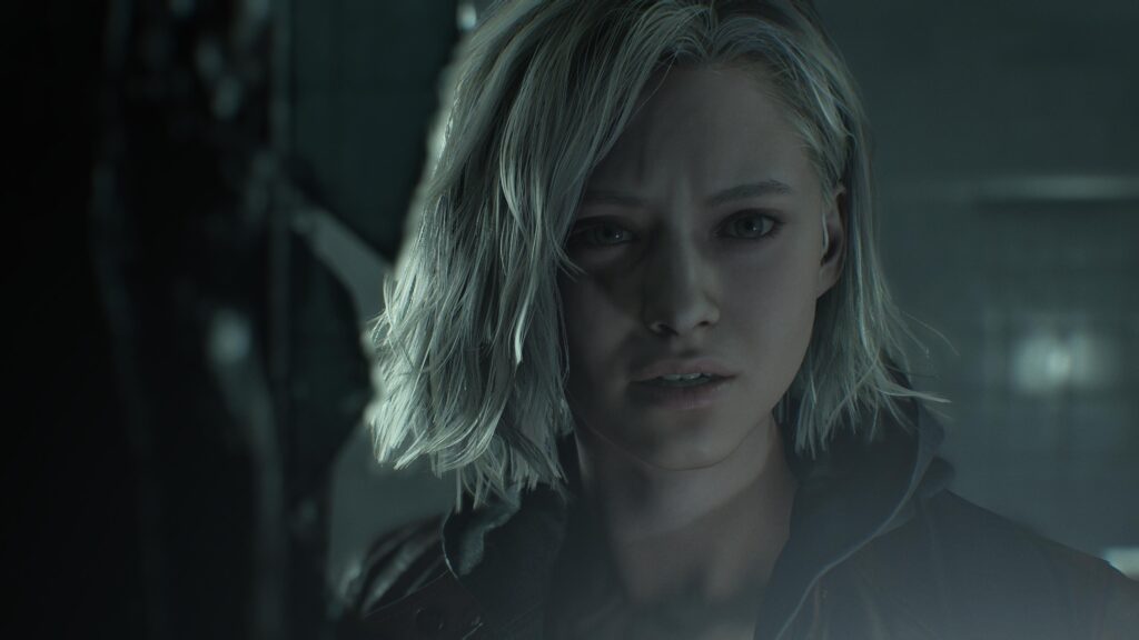 Personagem Grace em close com expressão tensa em ambiente escuro em Resident Evil Requiem