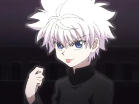 Imagem do Killua Zoldyck, personagem de Hunter x Hunter, em close, com cabelo branco e olhar confiante, usando roupa escura; fundo desfocado em tons escuros, sugerindo um clima de tensão e foco.
