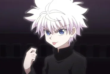 Imagem do Killua Zoldyck, personagem de Hunter x Hunter, em close, com cabelo branco e olhar confiante, usando roupa escura; fundo desfocado em tons escuros, sugerindo um clima de tensão e foco.