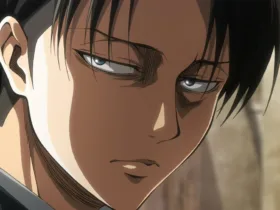 Close no rosto de Levi, personagem de *Attack on Titan*, com expressão séria e olhar cansado, em um enquadramento escuro e tenso que reforça a ideia de controle e rigidez emocional.