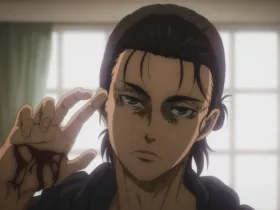 Close do personagem Eren Yeager, com expressão séria e cansada, levantando a mão com marcas de sangue enquanto encara a frente, sugerindo a transformação de alguém que jurava odiar a violência em alguém capaz de atravessar a mesma linha.