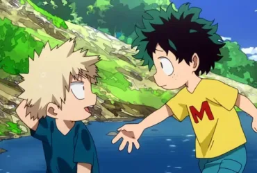 Cena de My Hero Academia com Izuku Midoriya, o Deku, ainda criança e usando camiseta amarela, estendendo a mão para Katsuki Bakugo, que está sentado perto de um riacho. Ao fundo há árvores, pedras e céu azul, em uma lembrança da infância dos dois.