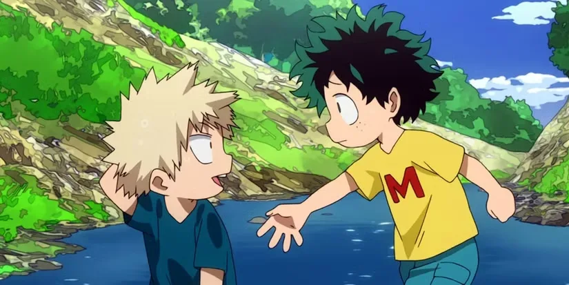 Cena de My Hero Academia com Izuku Midoriya, o Deku, ainda criança e usando camiseta amarela, estendendo a mão para Katsuki Bakugo, que está sentado perto de um riacho. Ao fundo há árvores, pedras e céu azul, em uma lembrança da infância dos dois.